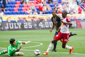 John McCarthy of the Philadelphia Union stops a run by the Red Bulls' Bradley Wright-Phillips. Photo: Bob Larson | Stellar Performance Photography | FULL GALLERY