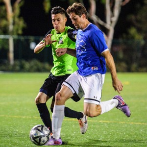 Players from Outbreak FC (blue) and the San Pedro Monsters battle for the ball in a 2016 US Open Cup qualifying match. Photo: Joe Walsh