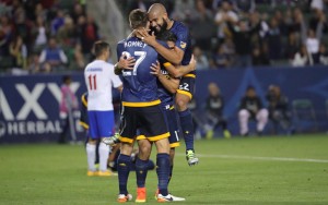 Dave Romney of the LA Galaxy celebrates his goal against La Maquina in the 2016 US Open Cup. Teammate Jose Villarreal is shown injured in the background. Photo: LA Galaxy 