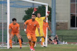 Fabian Cerda of the Tulsa Roughnecks (yellow) gets ready for a corner kick against San Antonio FC in the Third Round of the 2017 US Open Cup. Credit: Lori Scholl