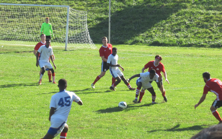 Junior Lone Star U-23s (white) battle with United German Hungarians (red) in 2018 US Open Cup qualifying. Photo: Kari Berton