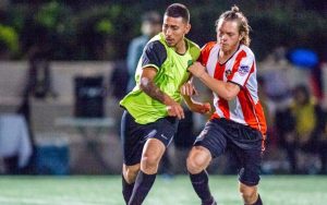 Kyle O'Brien (orange) of Santa Ana Winds battles for the ball in a 2018 US Open Cup qualifier against the San Pedro Monsters. Photo: Santa Ana Winds