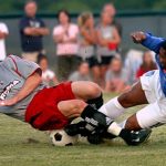Kiley Couch of Dallas Roma FC (left) challenges for the ball against Romario of Miami FC during their Second Round match during the 2006 US Open Cup. Photo: Dallas Roma FC