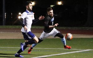 Players from West Chester United (right) and Safira FC battle for the ball during their Fourth Round match in the 2019 US Open Cup Open Division Local qualifying tournament. Photo: Chris Aduama