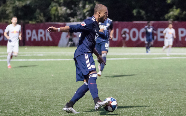 Teal Bunbury of the New England Revolution controls the ball in a Fourth Round match in the 2019 US Open Cup against the New York Red Bulls. Photo: Bob Larson