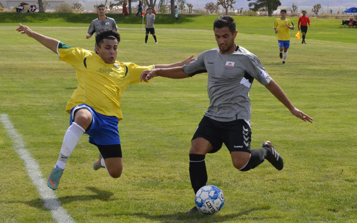 Art Aghasi of Cal FC (right) plays the ball against Quickening in the 2020 US Open Cup qualifying tournament. Photo: Victor Friedman | Cal FC