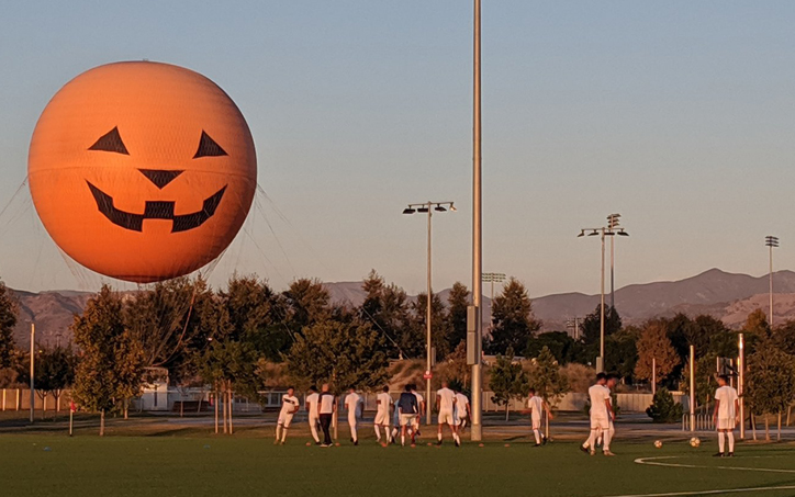 A giant pumpkin balloon overlooks the field at Orange County Great Park in Irvine, Calif. before the 2020 US Open Cup qualifier between Cal FC and Alta California Sol. Photo: Victor Friedman | Cal FC