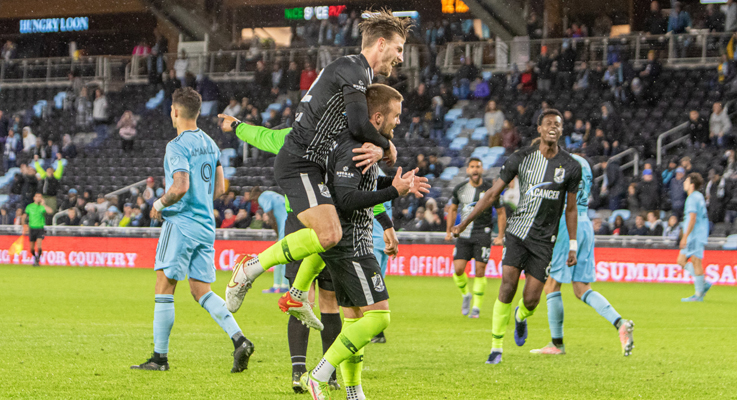 Union Omaha players celebrate after the club's 2-1 road win over Minnesota United FC in the Fifth Round of the 2022 US Open Cup. Photo: Matt Johnson (Twitter: @mattjphoto)