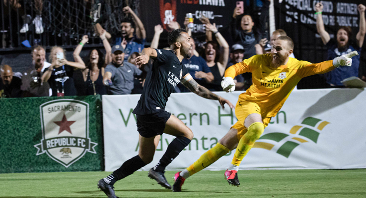 Rodrigo Lopez (left) and goalkeeper Danny Vitiello celebrate after Lopez scored the game-winning penalty kick to give Sacramento Republic a 5-4 win over Sporting KC in the 2022 US Open Cup Semifinals. Photo: Sacramento Republic FC