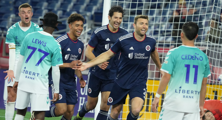 David Romney of the New England Revolution celebrates with his teammates after scoring a goal against the Hartford Athletic in the 2023 US Open Cup. Photo: New England Revolution