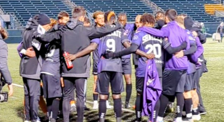Flower City Union huddle up during the club's 2023 US Open Cup match against Manhattan SC. Photo: Flower City Union