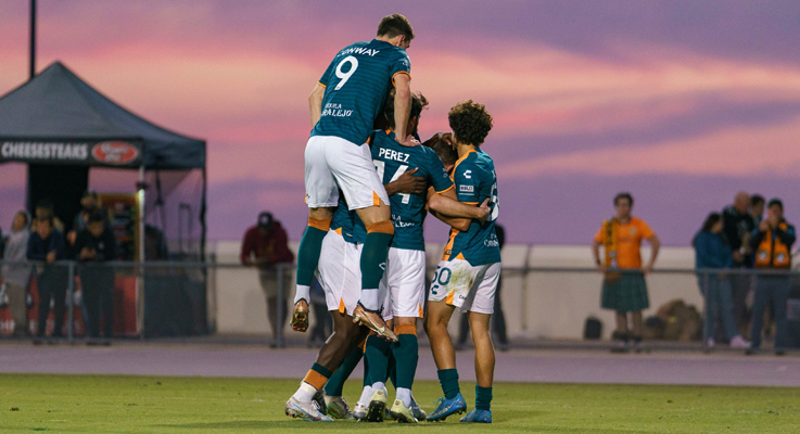 San Diego Loyal players celebrate after scoring a gaol against ALBION San Diego in the 2023 US Open Cup. Photo: San Diego Loyal