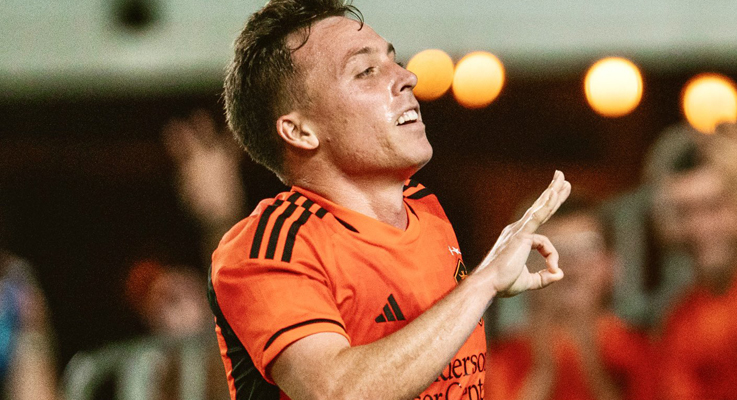 Corey Baird of the Houston Dynamo celebrates after scoring his third goal against Minnesota United in the Round of 16 of the 2023 US Open Cup. Photo: Houston Dynamo