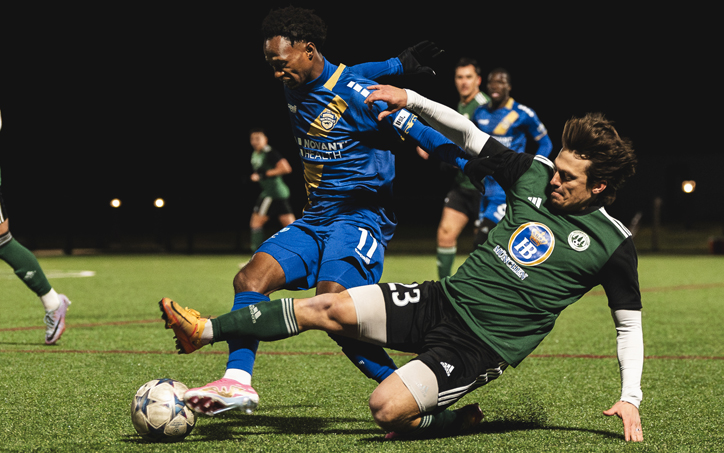 Players from the Charlotte Independence (blue) and Vereinigung Erzgebirge battle for the ball in the First Round of the 2024 US Open Cup. Photo: Justin Nunez