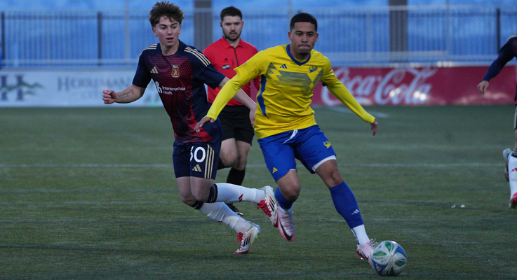 Players from El Farolito (right) and Real Monarchs battle for the ball in a First Round match in the 2025 US Open Cup. Photo: J. Derick Fox