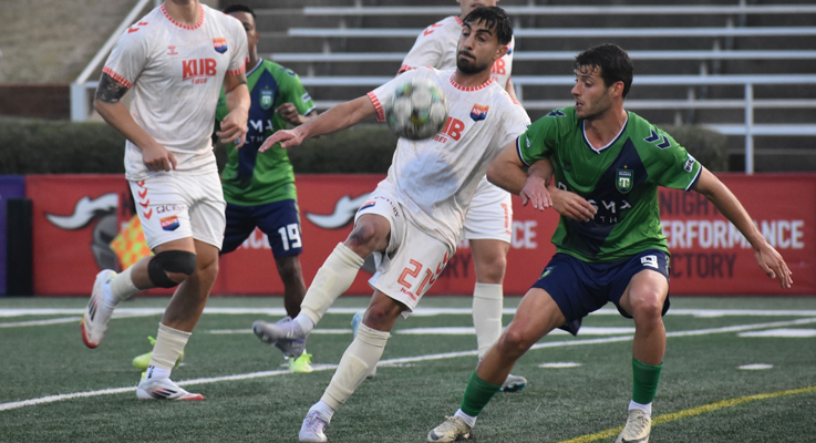 Players from One Knoxville SC and Greenville Triumph battle for the ball in the Second Round of the 2025 US Open Cup. Photo: Wade Wimberly | TheCup.us