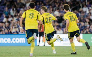 Wyatt Meyer (28) of Nashville SC celebrates with his teammates after scoring a 79th minute goal against Orlando City SC in the 2025 US Open Cup. Photo: Nashville SC