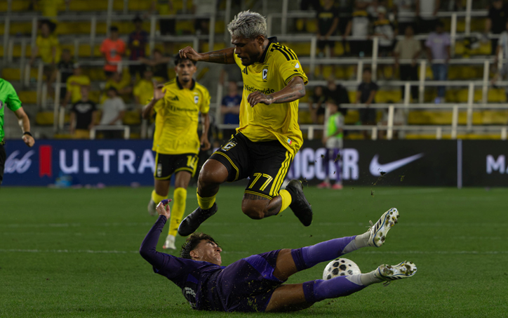 Josef Martinez of the Columbus Crew avoids a tackle against Orlando City SC in the 2026 US Open Cup Semifinals. Photo: Carlos Hernandez-Chavez - Black Cat Photography